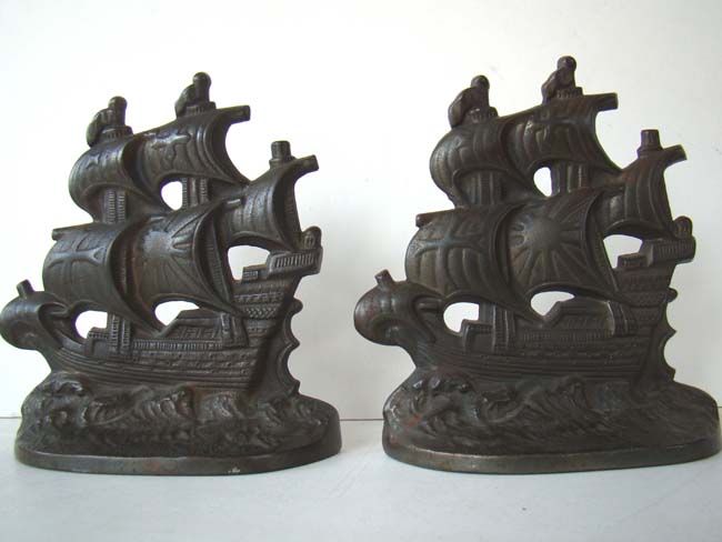 A pair of 'Spanish Galleon' cast iron bookends circa 1928